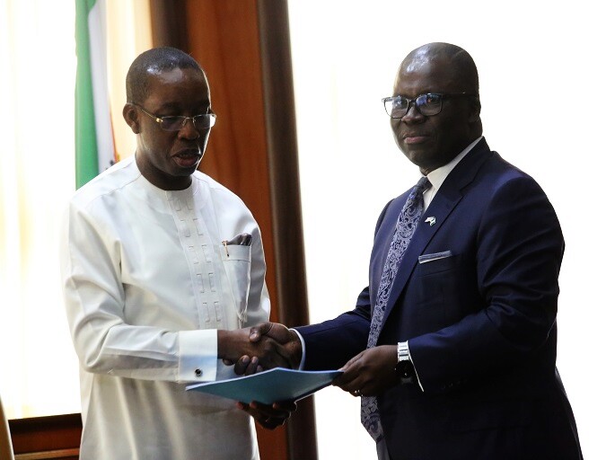 Gov. Ifeanyi Okowa (left) and Chairman, Alpha Energy and Electric Company, Ike Nwabuonwu