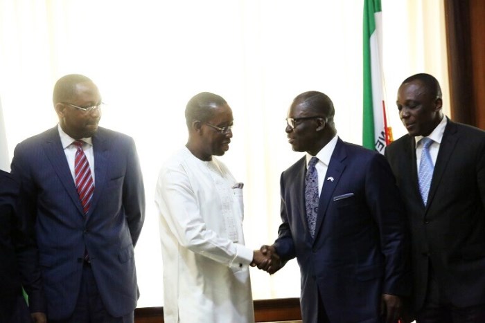 Gov. Ifeanyi Okowa (left) and Chairman, Alpha Energy and Electric Company, Ike Nwabuonwu